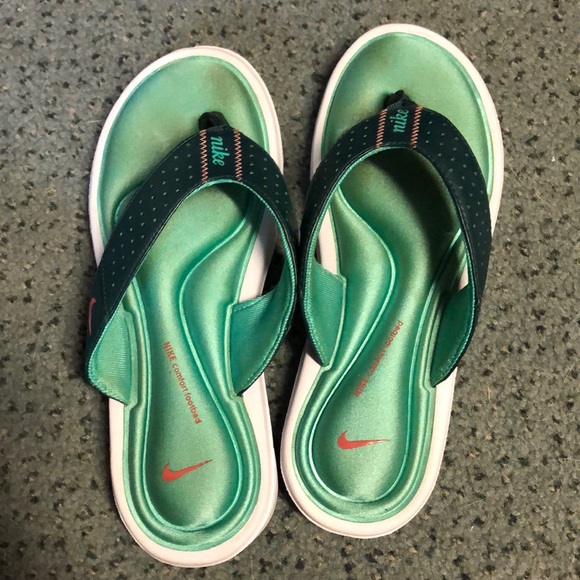 green nike flip flops